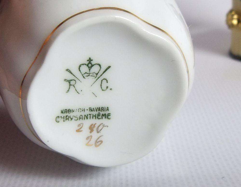An early 20th centrury Bavarian porcelain duo in the Chrysantheme pattern , espresso sized