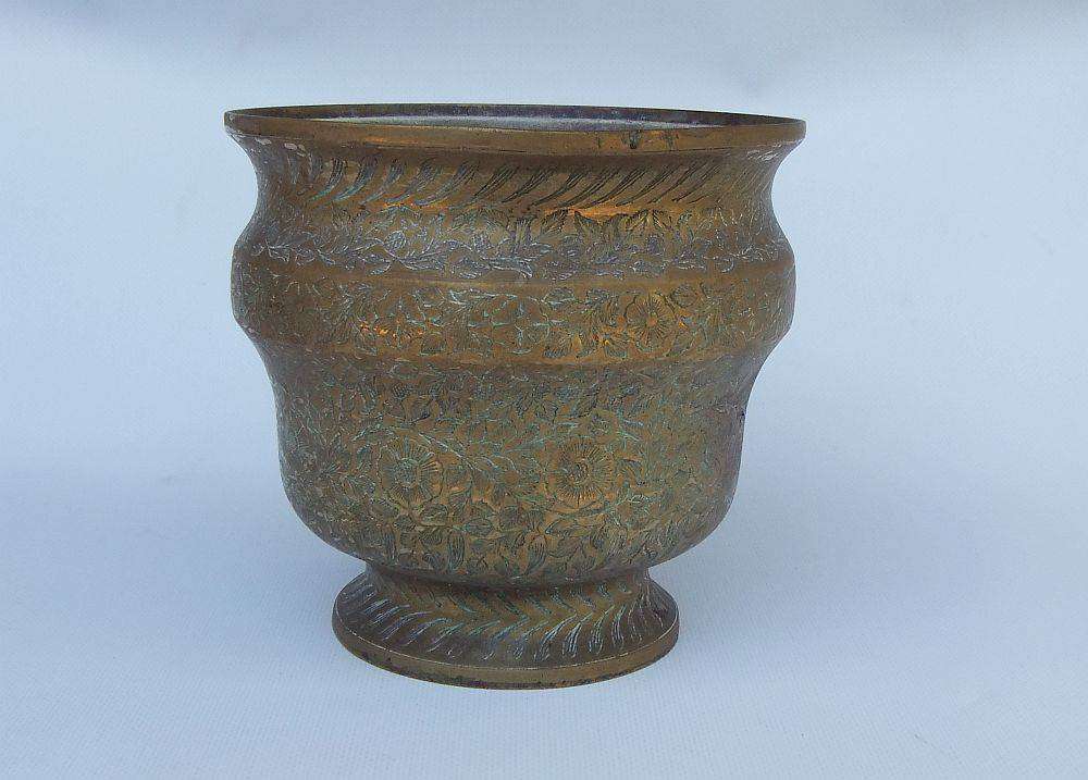 A highly detailed vintage bronze or brass planter possibly of Indian origin