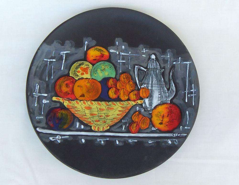 A rare mid-century signed Italian pottery wall charger with intricate detail