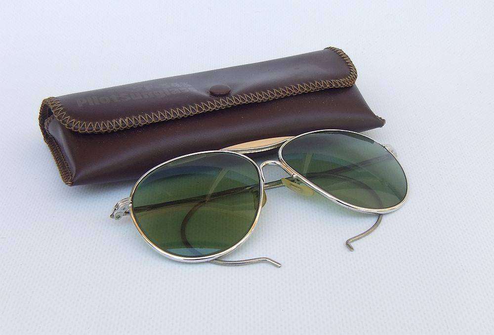 An original pair of vintage F-343 Pilot sunglasses in excellent condition with pouch