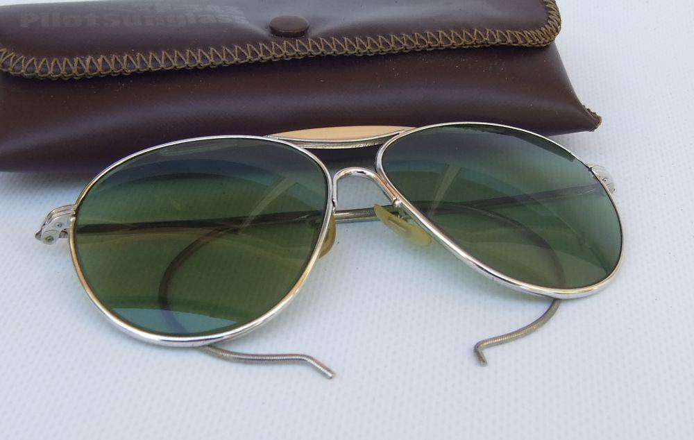 An original pair of vintage F-343 Pilot sunglasses in excellent condition with pouch