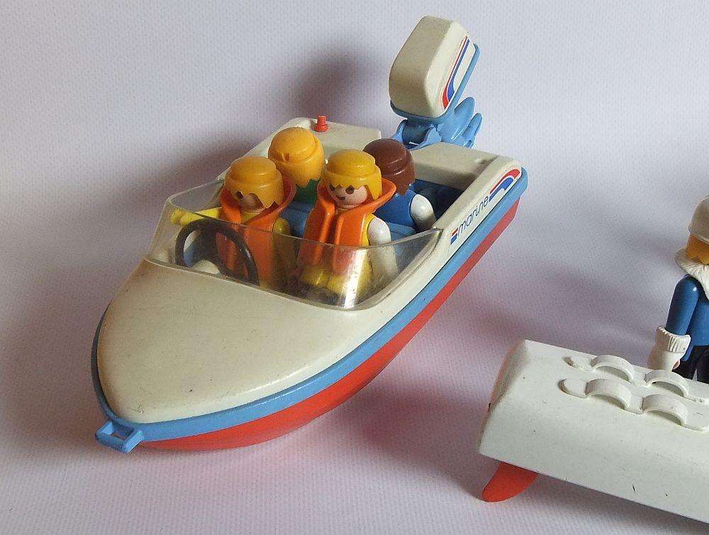 Thirty two pieces of vintage Playmobil toys including animals , boats and accessories