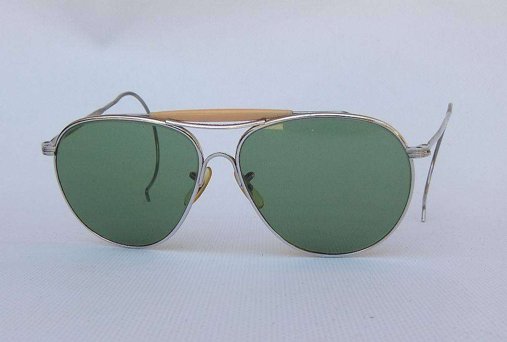 An original pair of vintage F-343 Pilot sunglasses in excellent condition with pouch