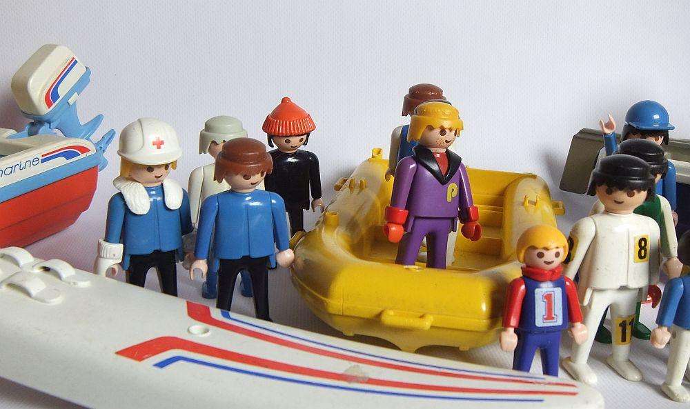 Thirty two pieces of vintage Playmobil toys including animals , boats and accessories