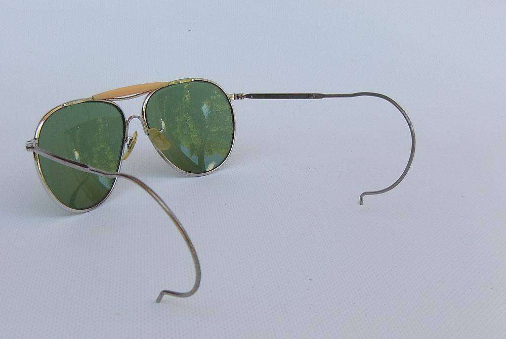 An original pair of vintage F-343 Pilot sunglasses in excellent condition with pouch