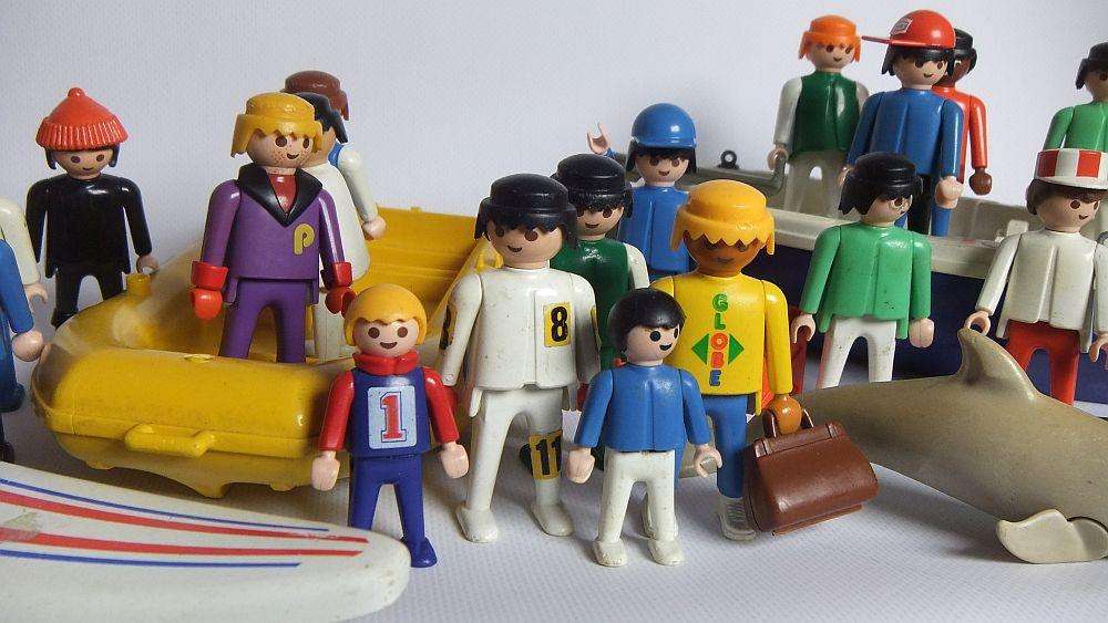 Thirty two pieces of vintage Playmobil toys including animals , boats and accessories