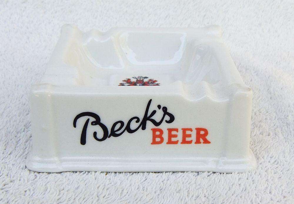 A vintage German porcelain ashtray advertising Bek`s Beer