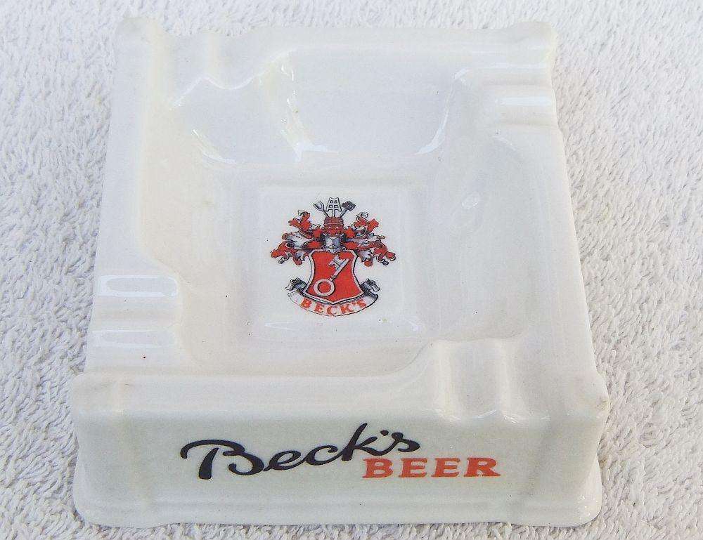 A vintage German porcelain ashtray advertising Bek`s Beer