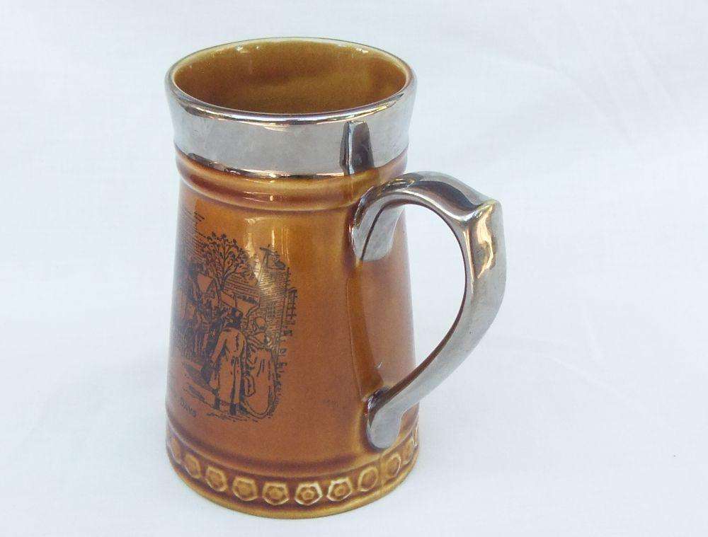 A vintage jug with Coaching Days theme made by Lord Nelson pottery England