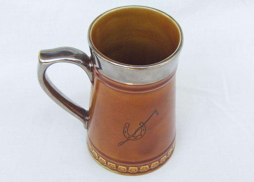 A vintage jug with Coaching Days theme made by Lord Nelson pottery England