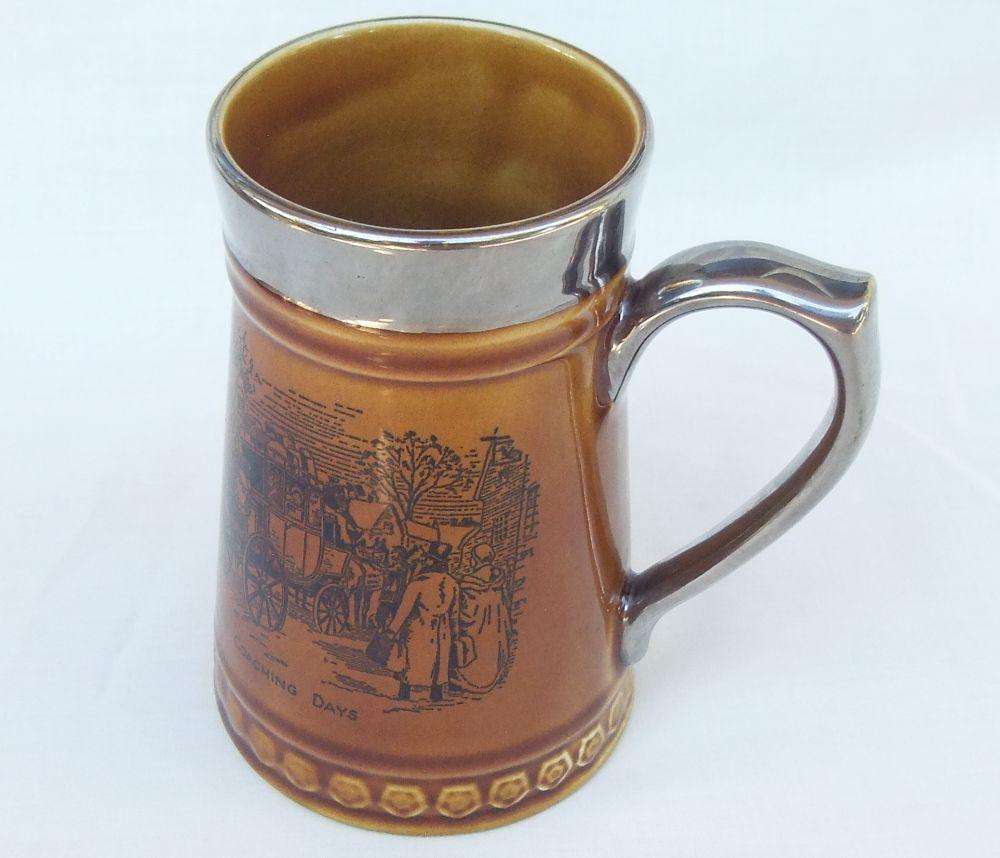 A vintage jug with Coaching Days theme made by Lord Nelson pottery England