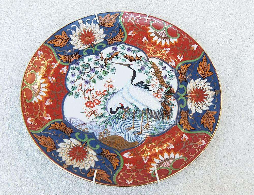 A large vintage genuine Japanese Imari porcelain charger / wall plate