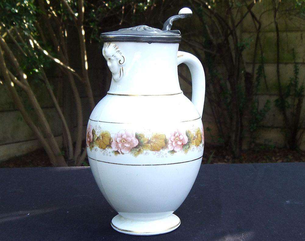 A rare antique mid 1800`s tankard with hinged pewter lid