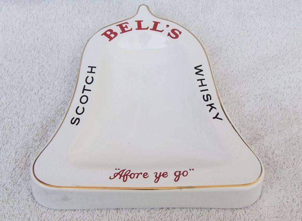 A vintage Bells whisky advertising bar ashtray made by Wade England