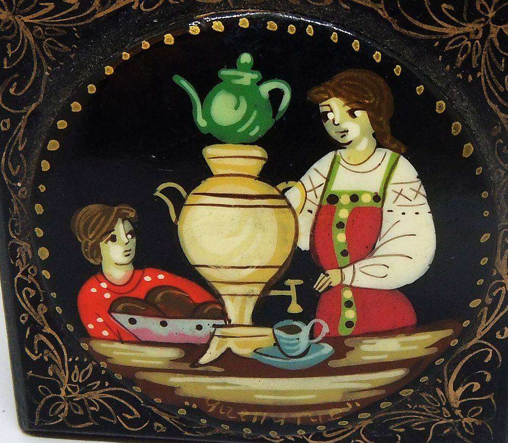 A vintage Russian hand painted and signed trinket box with feast motif in excellent condition