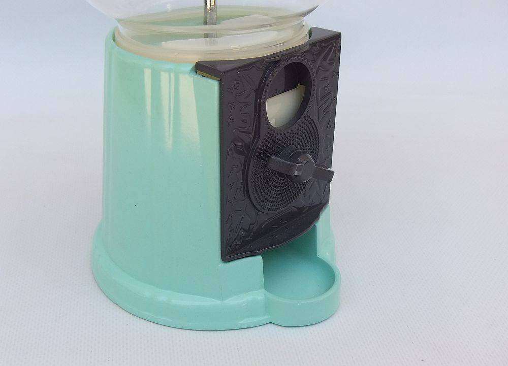 An awesome vintage look , glass , plastic and metal gumball machine in excellent condition