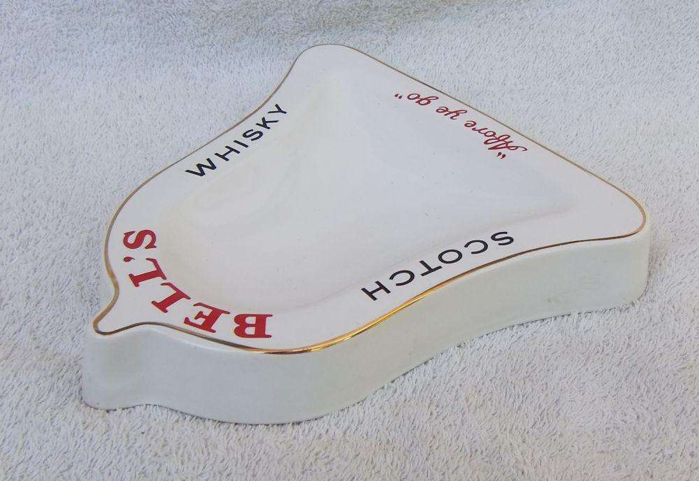 A vintage Bells whisky advertising bar ashtray made by Wade England