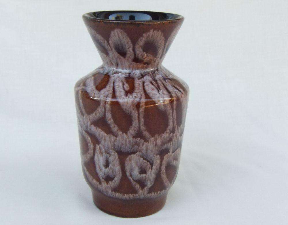 A vintage Austrian pottery vase with original makers tag still attached
