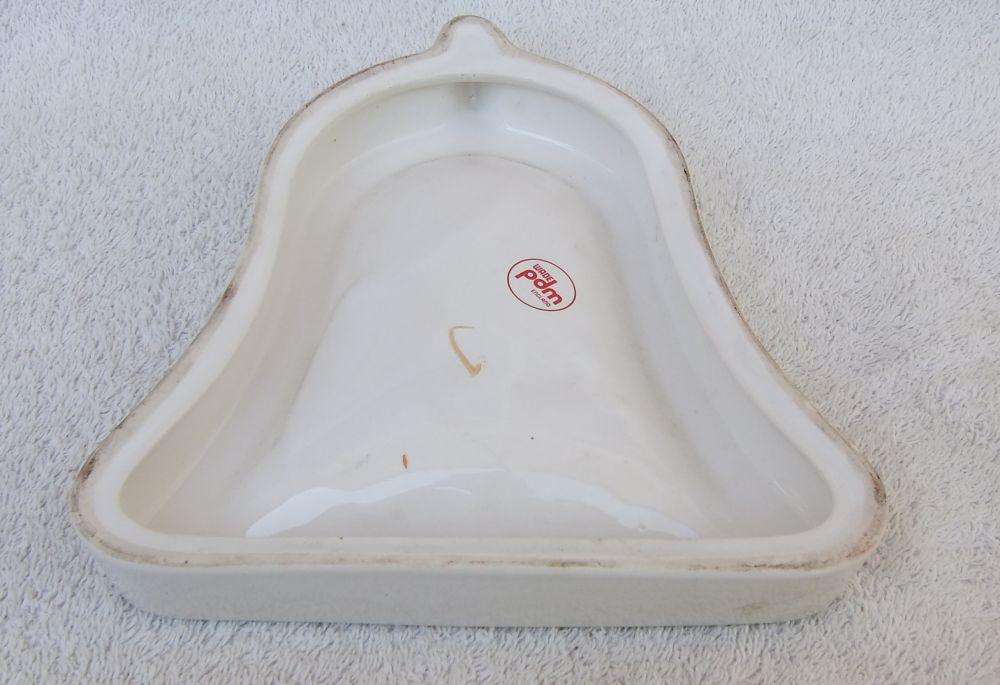 A vintage Bells whisky advertising bar ashtray made by Wade England
