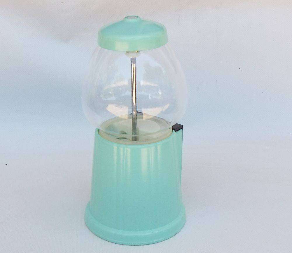An awesome vintage look , glass , plastic and metal gumball machine in excellent condition