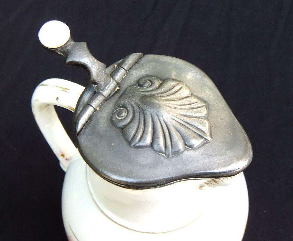 A rare antique mid 1800`s tankard with hinged pewter lid