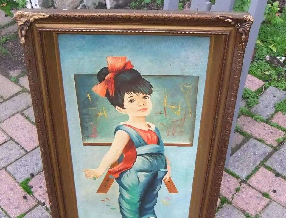 A beautiful vintage original oil on board painting of a young girl in an exquisite old frame