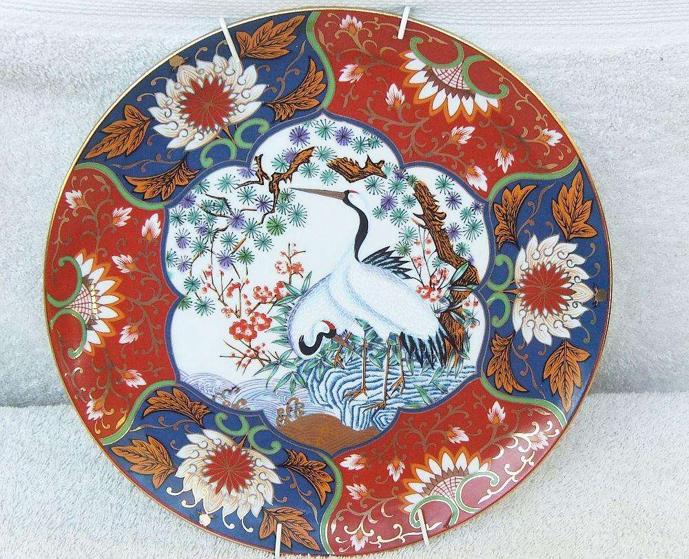 A large vintage genuine Japanese Imari porcelain charger / wall plate