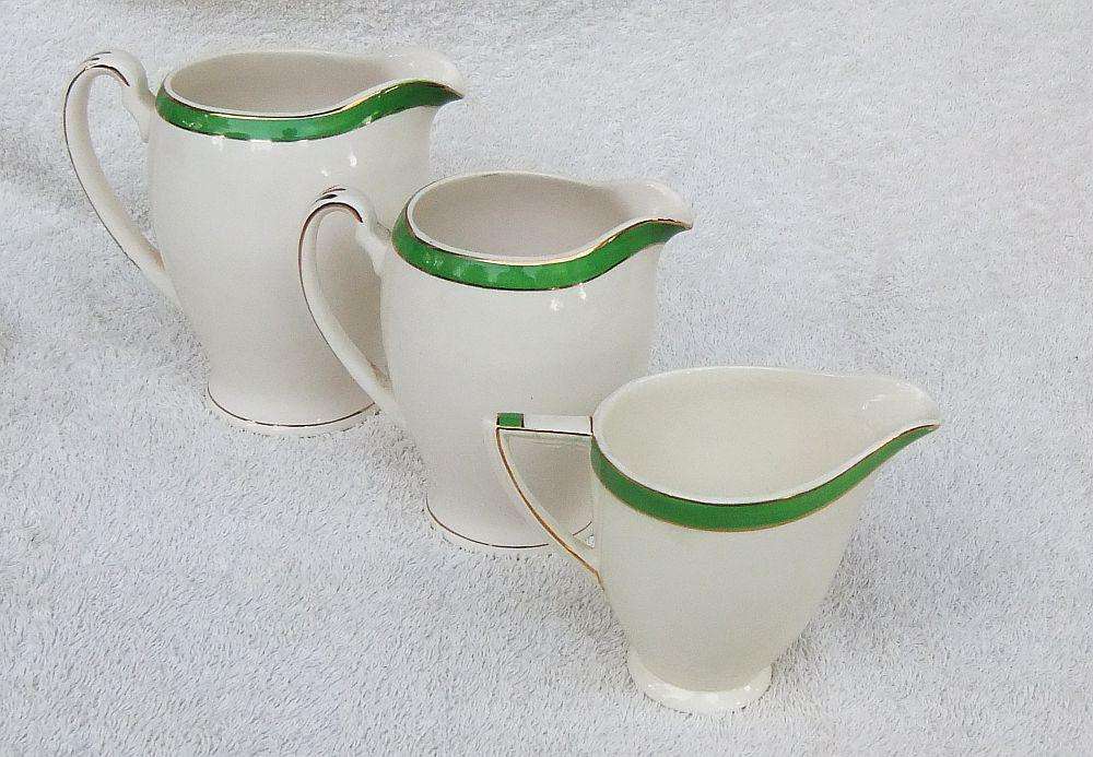 Three Art Deco period porcelain serving jugs by Alfred Meakin England