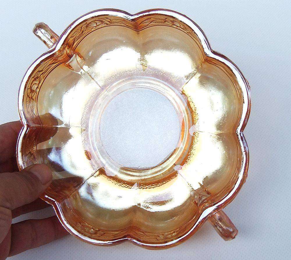 A beautiful old genuine Carnival glass bonbon dish with rose detail