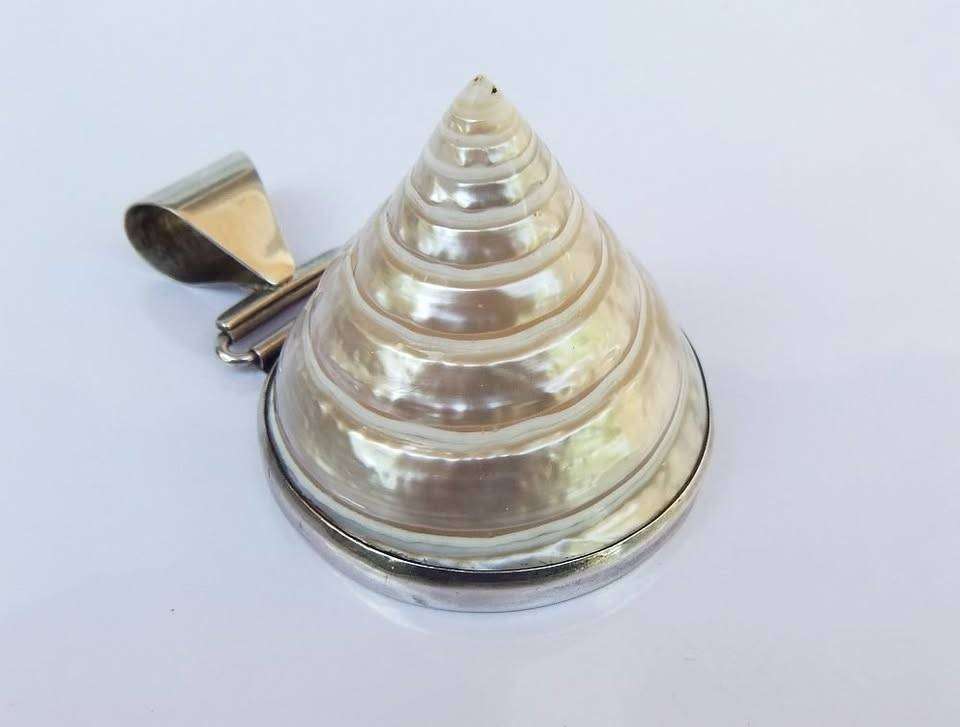 An exquisite unique Throchius Mother of Pearl pyramid top sea shell pendant set in sterling silver
