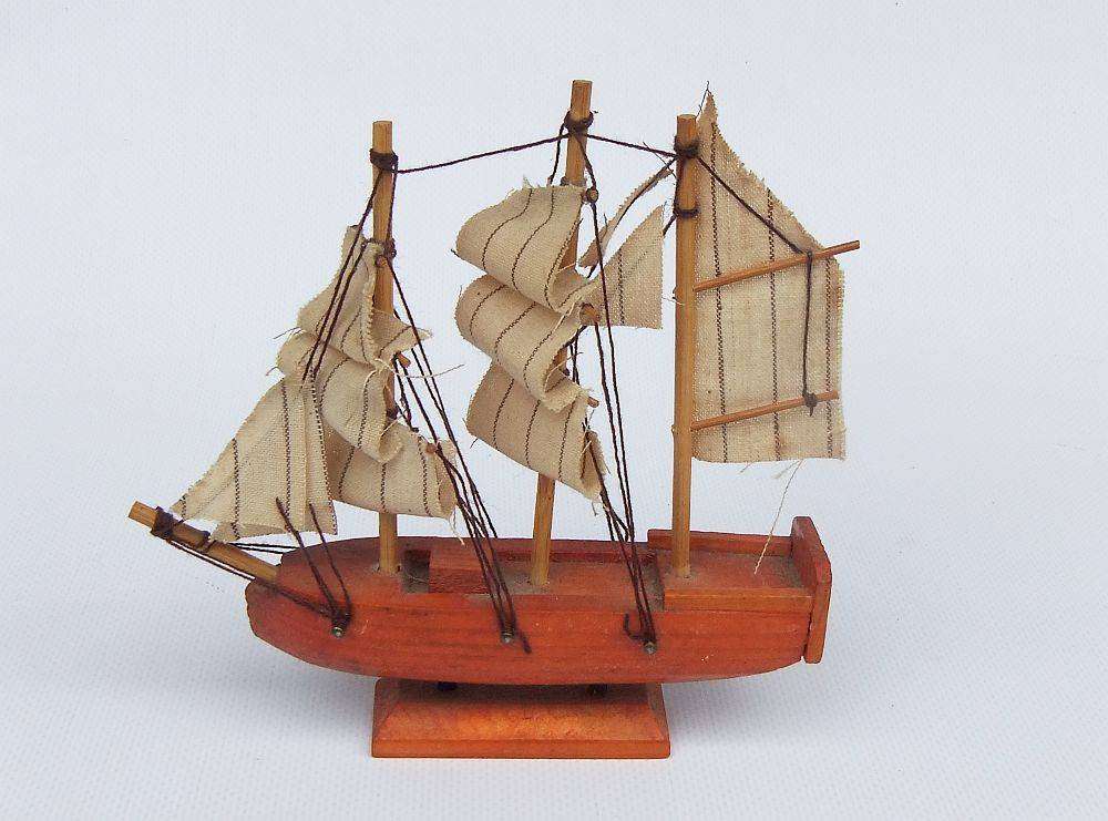 An interesting small vintage model of a sail ship with cloth sails