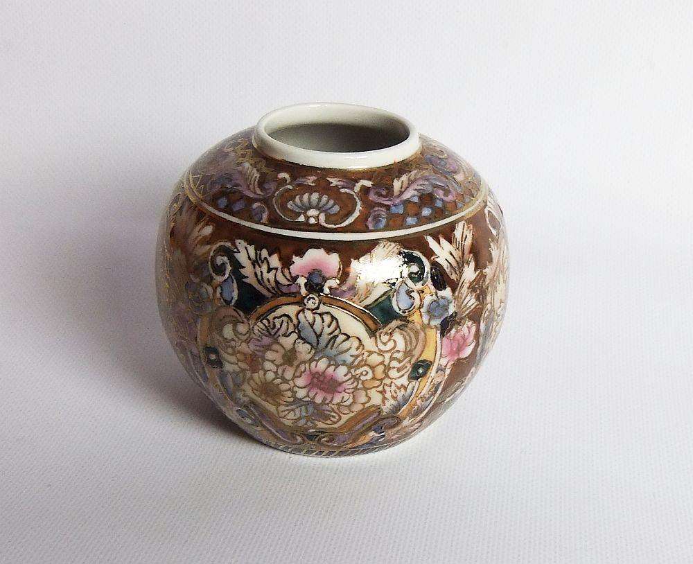 A vintage hand painted Japanese flower pot with makers stamp
