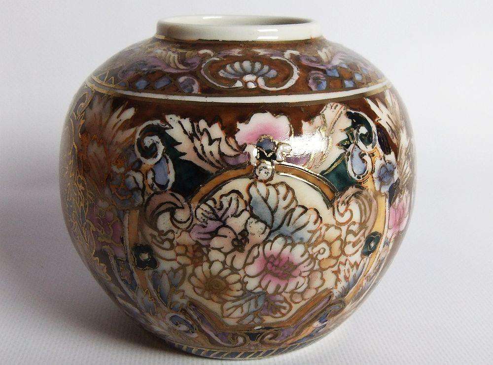A vintage hand painted Japanese flower pot with makers stamp