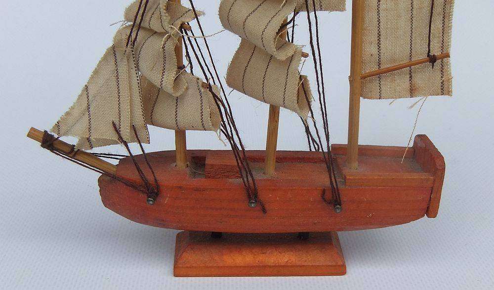 An interesting small vintage model of a sail ship with cloth sails