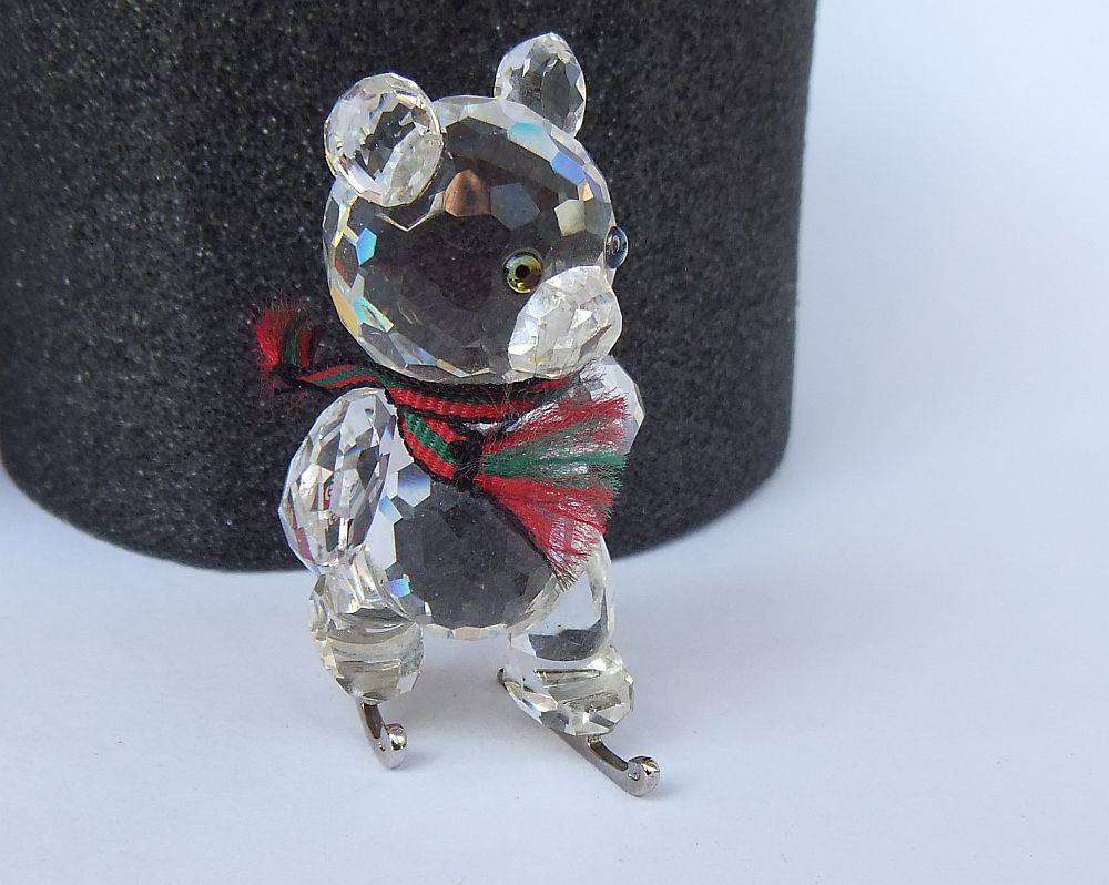 A highly collectable vintage Swarovski crystal ice skating Kris bear in original box