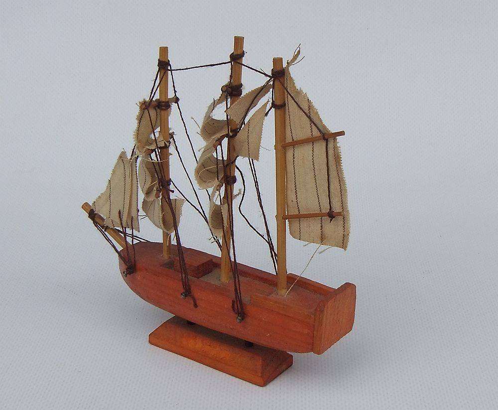 An interesting small vintage model of a sail ship with cloth sails