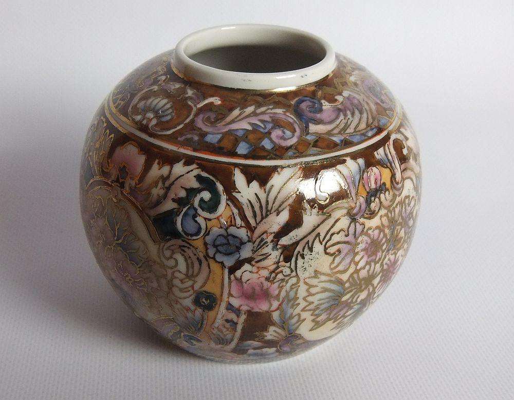 A vintage hand painted Japanese flower pot with makers stamp