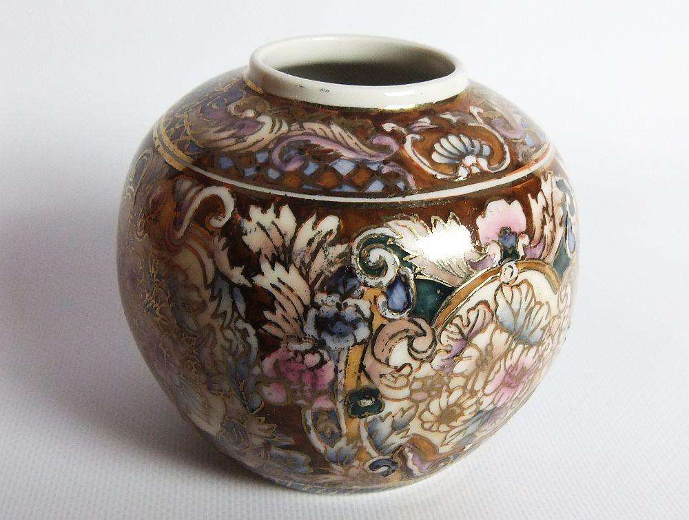 A vintage hand painted Japanese flower pot with makers stamp