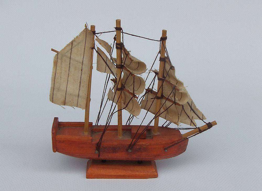 An interesting small vintage model of a sail ship with cloth sails