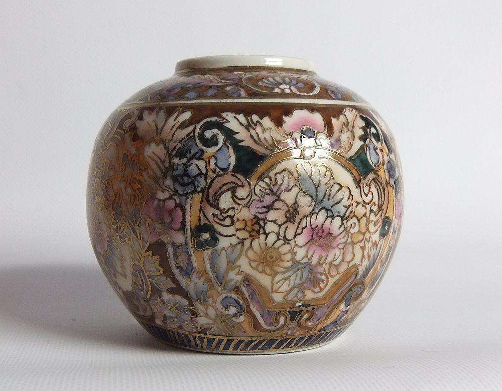 A vintage hand painted Japanese flower pot with makers stamp