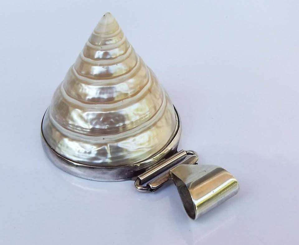 An exquisite unique Throchius Mother of Pearl pyramid top sea shell pendant set in sterling silver