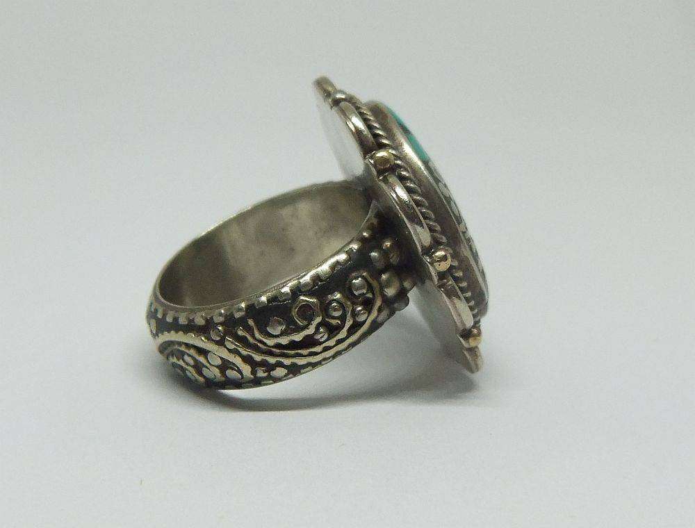 A gorgeous vintage quality Alpacca type white metal ring with various inlayed stones like Turquoise