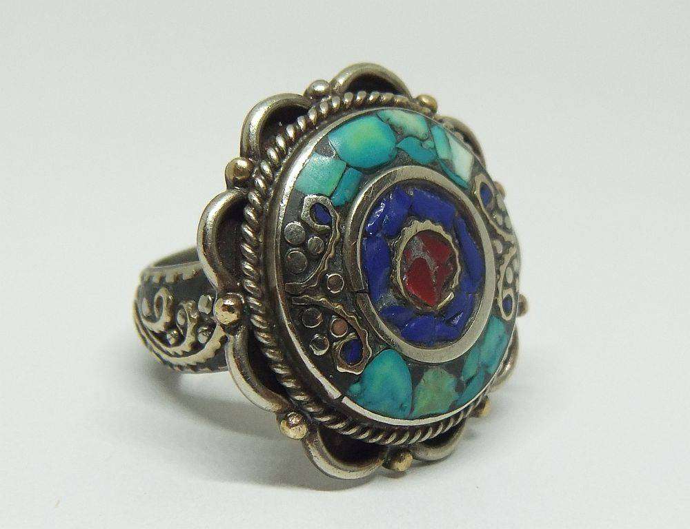 A gorgeous vintage quality Alpacca type white metal ring with various inlayed stones like Turquoise