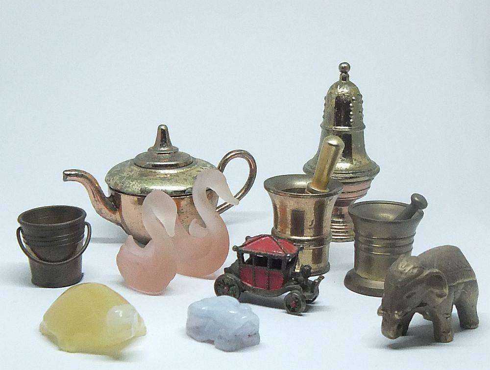 Vintage miniature lot - Stone tortoise and frog , glass swans , brass mortar and pestles and more