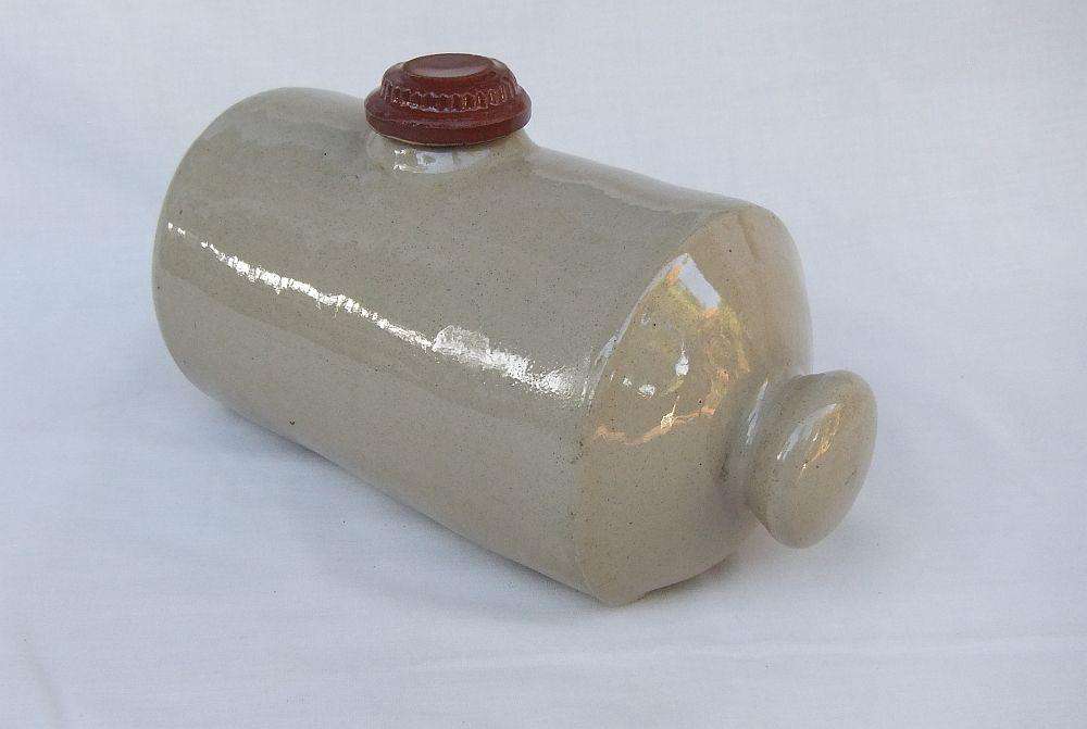 A very old stoneware pottery hot water bottle