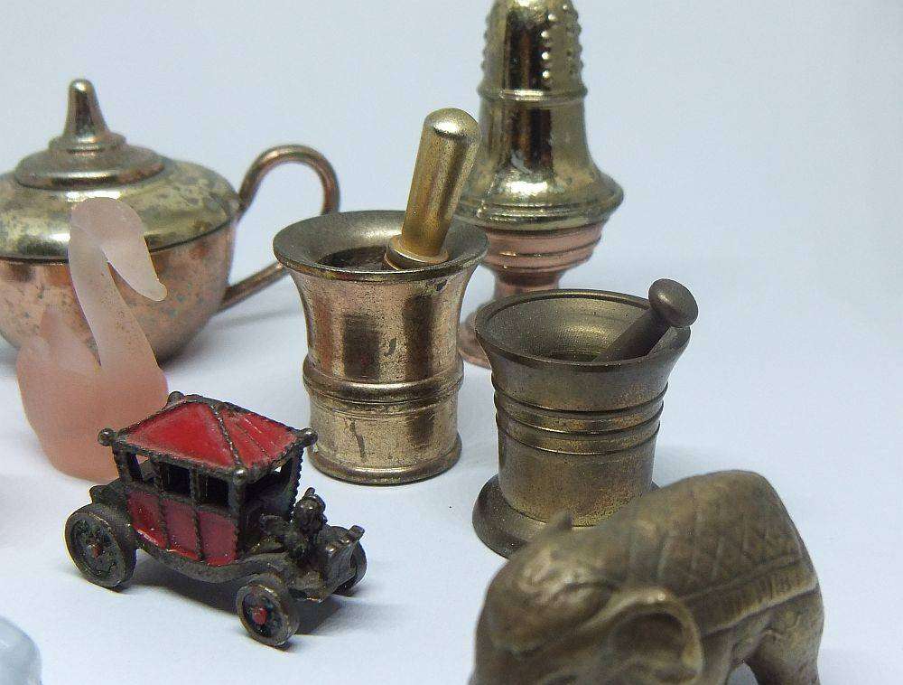 Vintage miniature lot - Stone tortoise and frog , glass swans , brass mortar and pestles and more