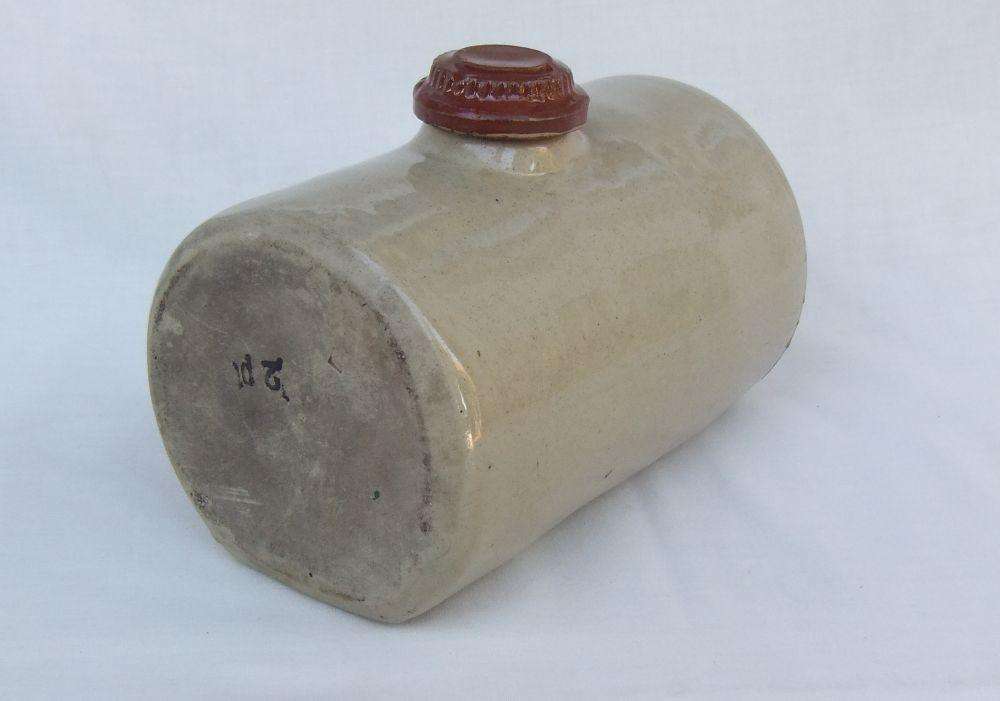 A very old stoneware pottery hot water bottle