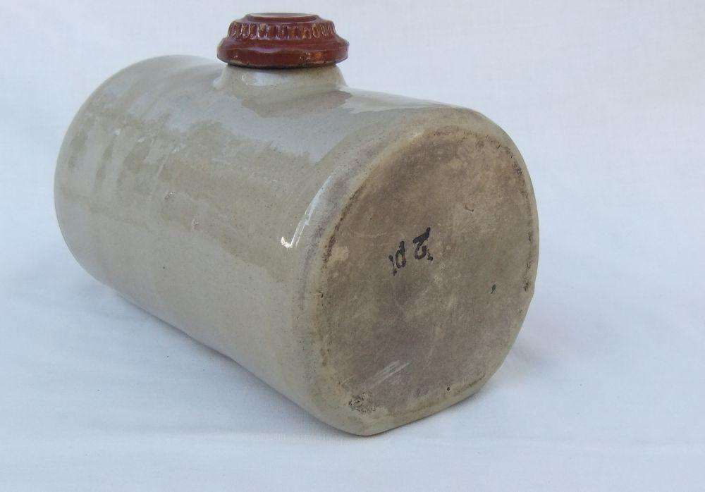 A very old stoneware pottery hot water bottle
