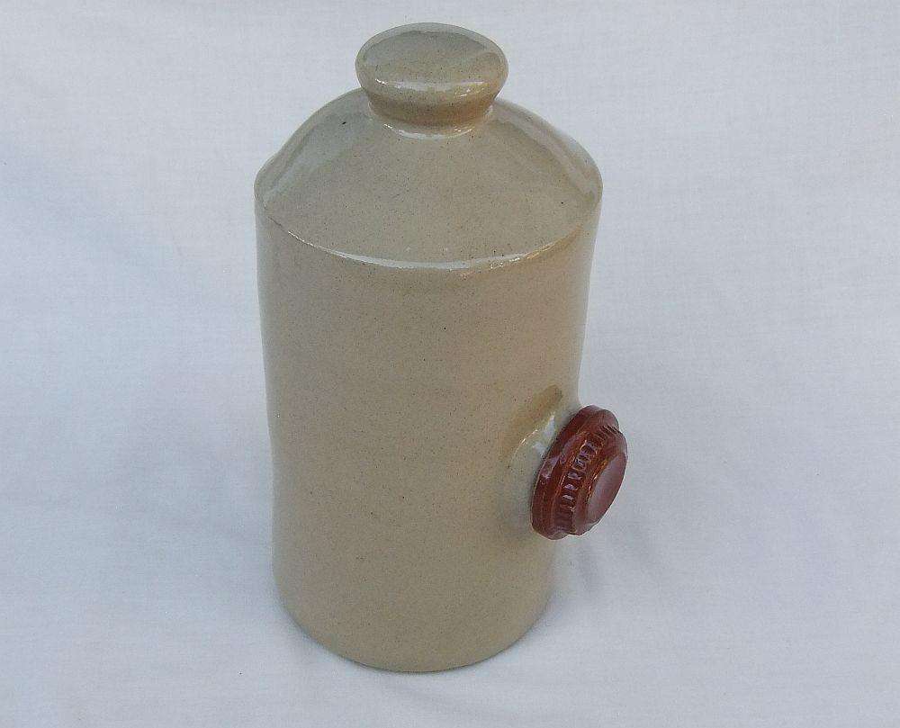 A very old stoneware pottery hot water bottle