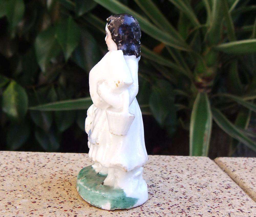 An extremely rare Victorian mother & child porcelain ornament